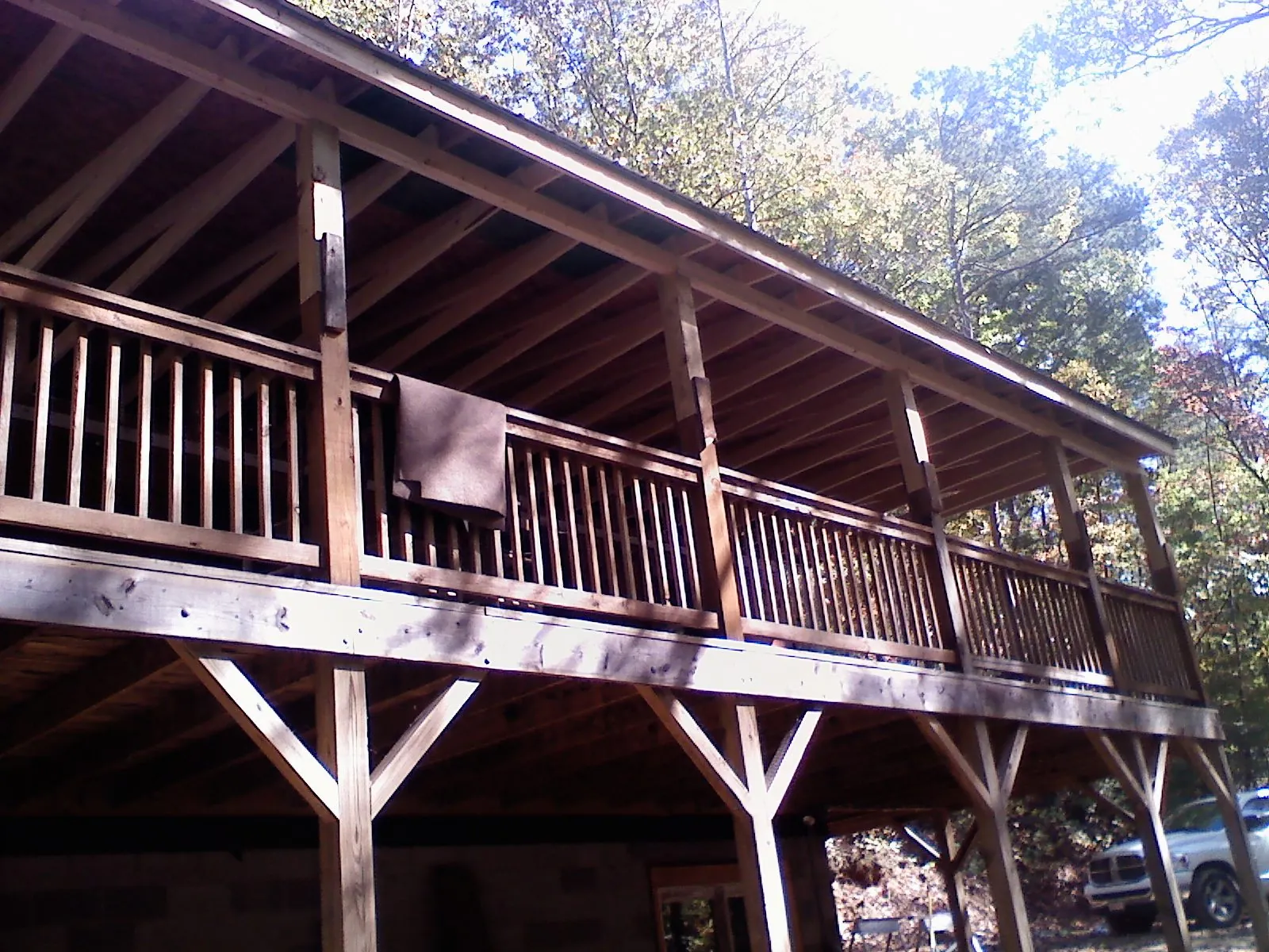 Timber framing under a new elevated porch and deck — Roof Leak Repair in Gates Mills by Roofing Brothers
